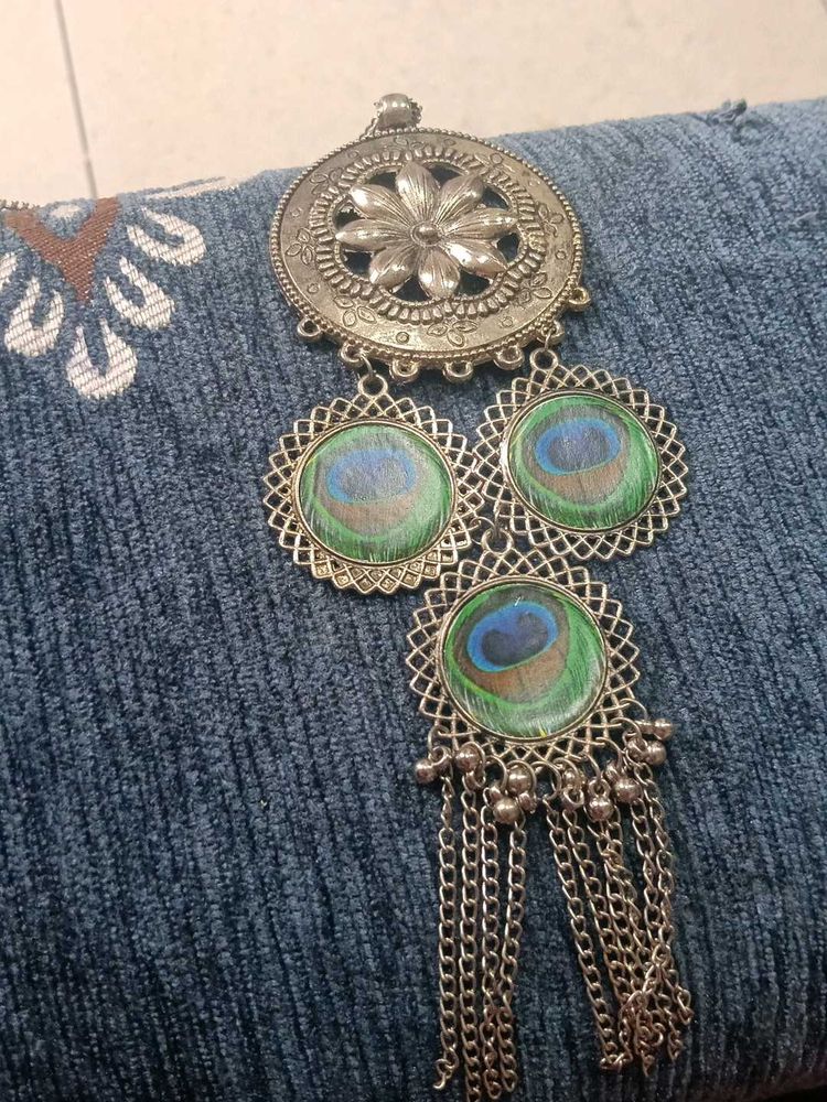oxidised silver long necklace with peacock feather