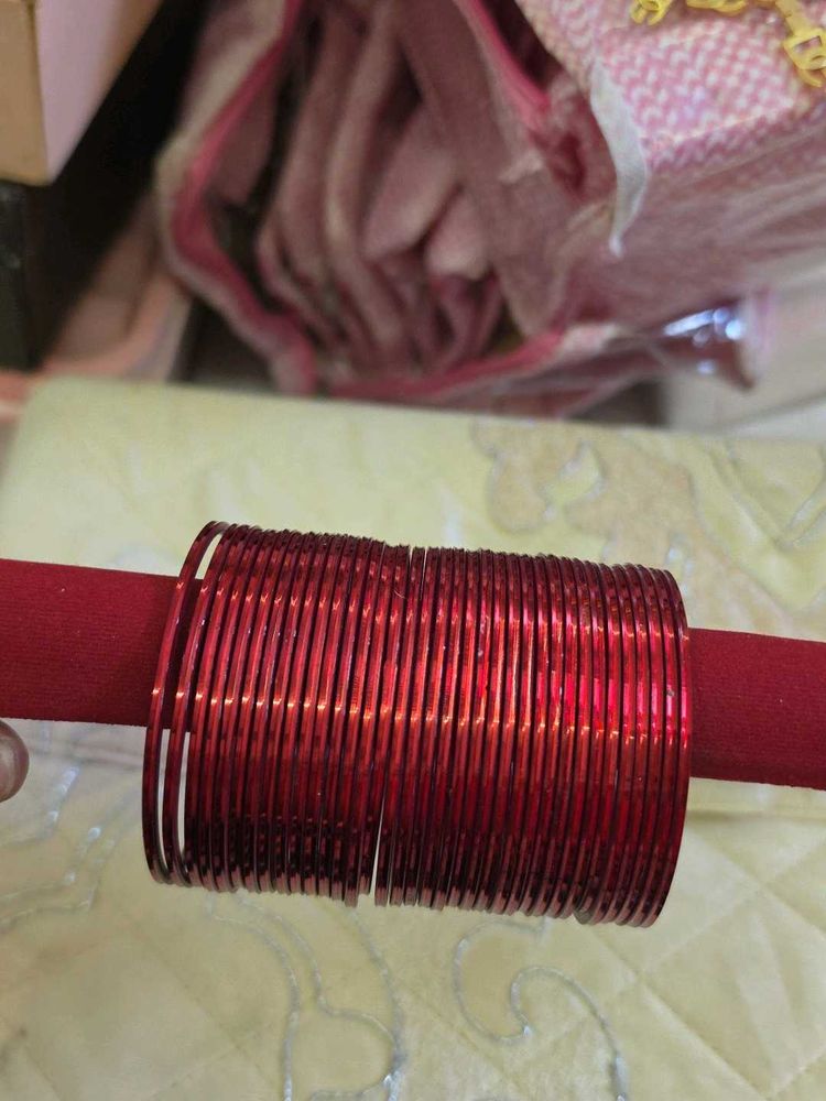 35 Set of Red Metal Bangles