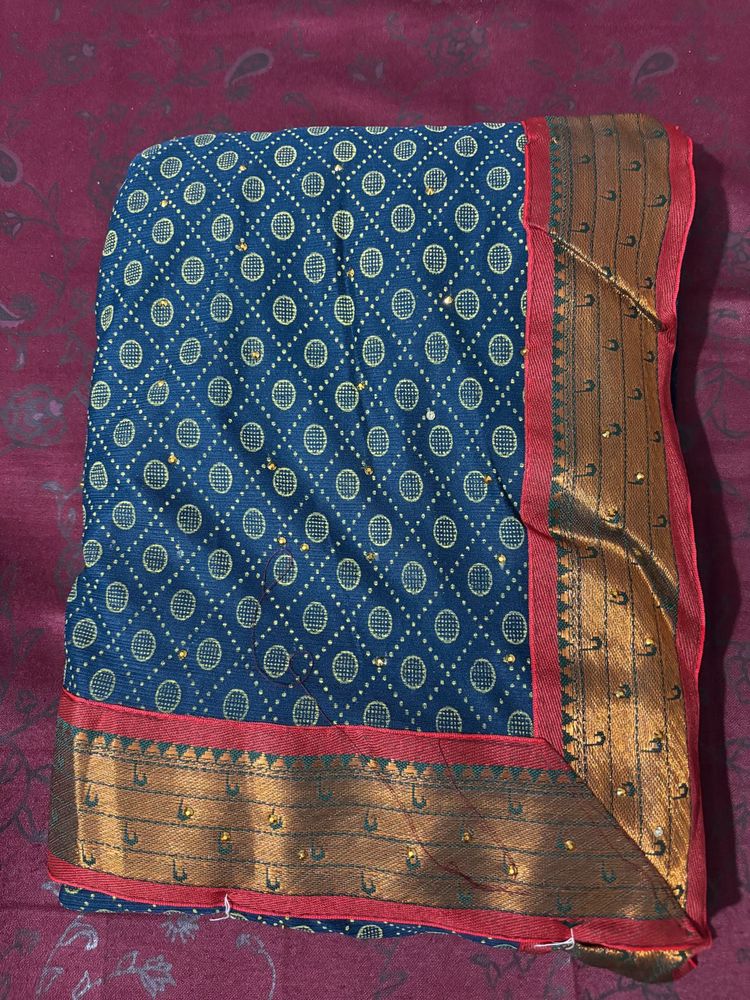 Beautiful Blue Saree with Gold Border