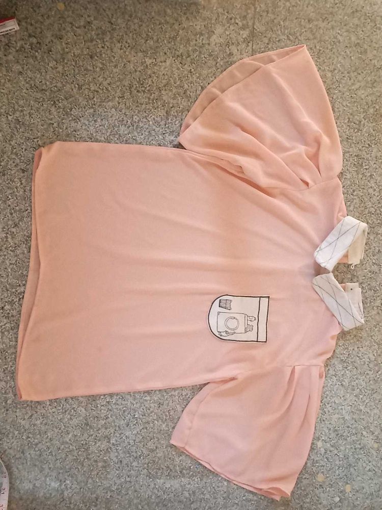 Peach cute crop top with a white collor