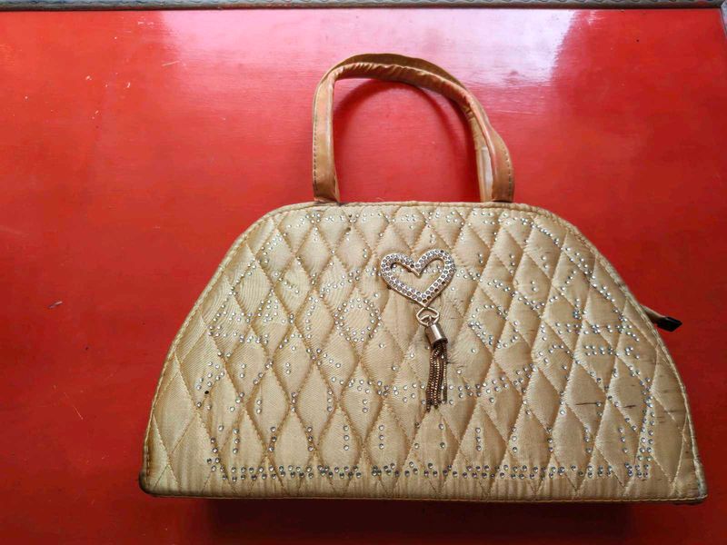 Quilted Beaded Handbag with Heart Charm