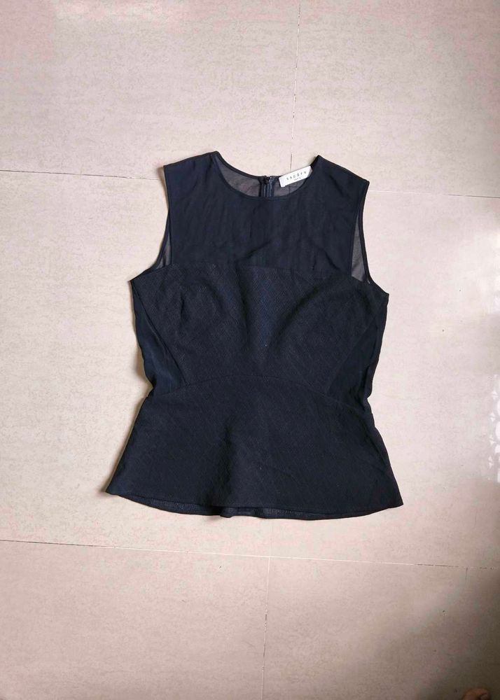 Sheer Black Peplum Top from paris