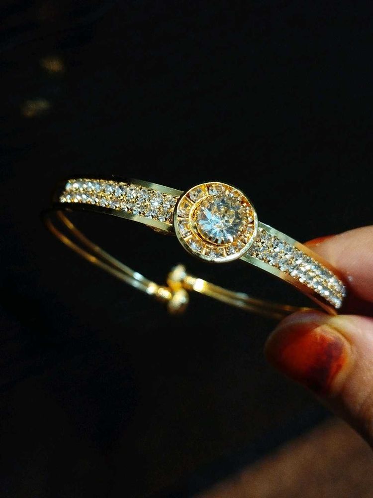 Elegant Gold Tone Bangle Bracelet with CZ Stones