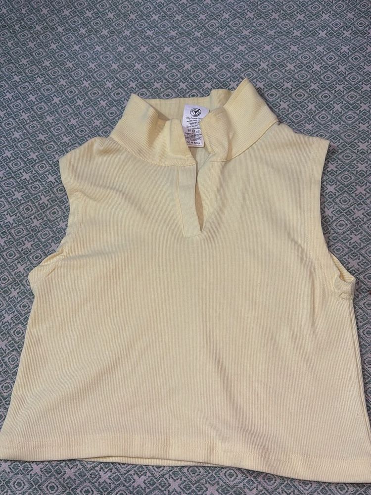 Sleeveless Yellow Polo top
