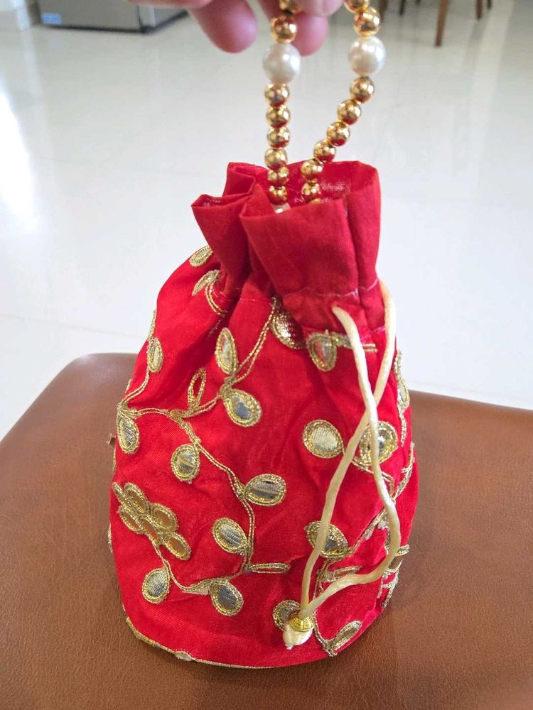 Red Potli Bag with Gold Embellishments