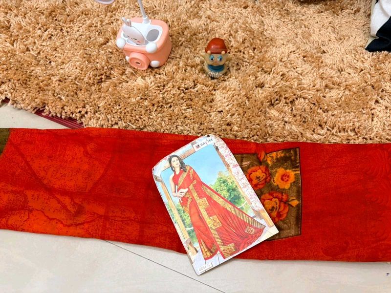 New Elegant Red Saree with Floral Accents