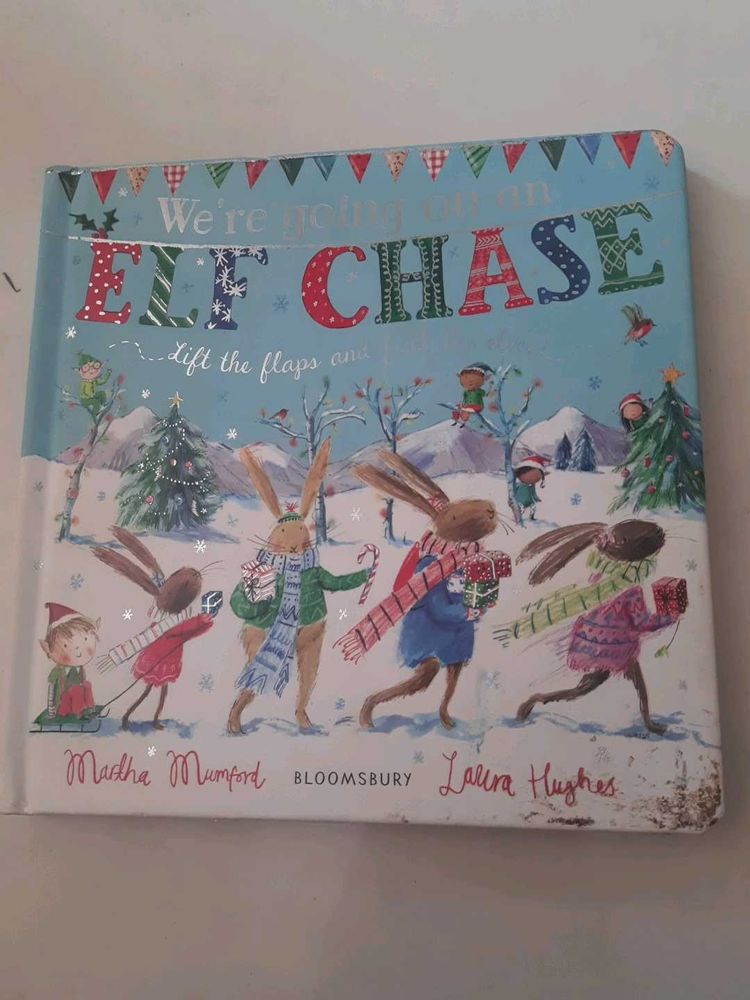 We're Going on an Elf Chase Lift-the-Flap Book