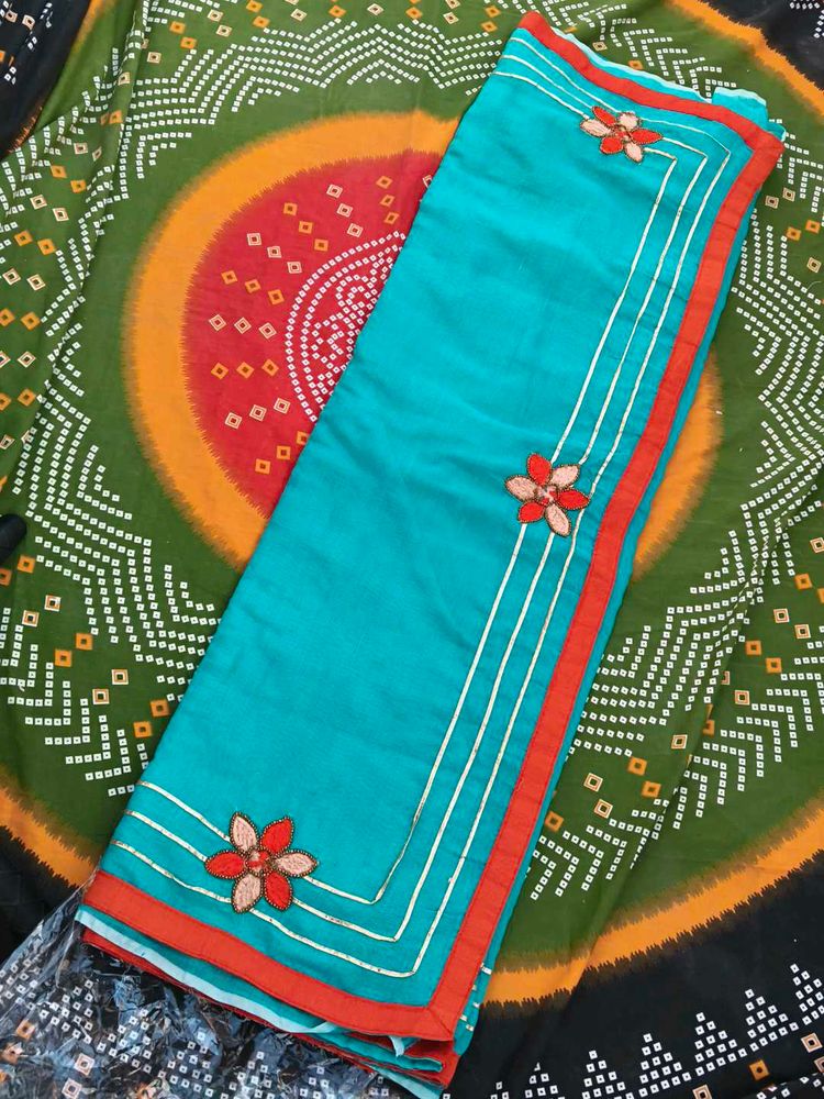 Elegant Turquoise Embellished Saree