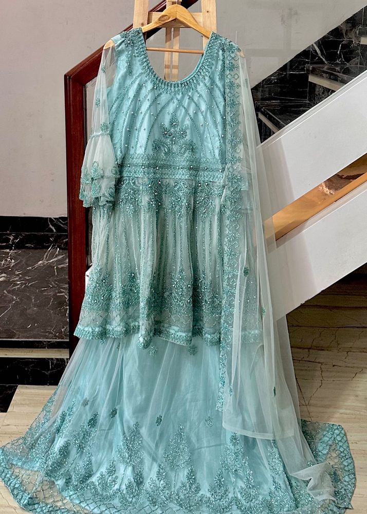 Stunning Teal Embellished Lehenga Choli