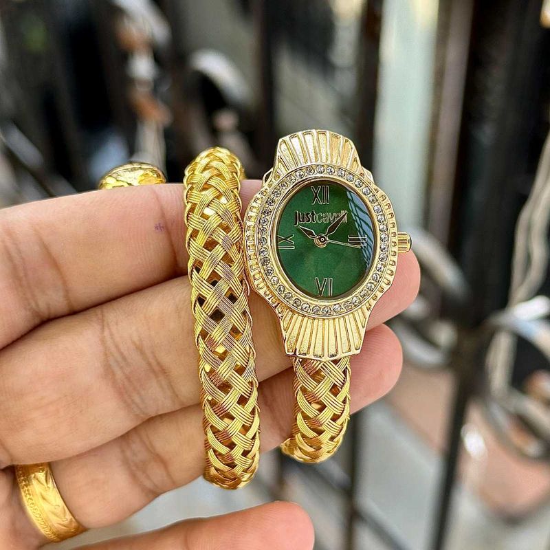 Elegant Gold Watch with Green Dial