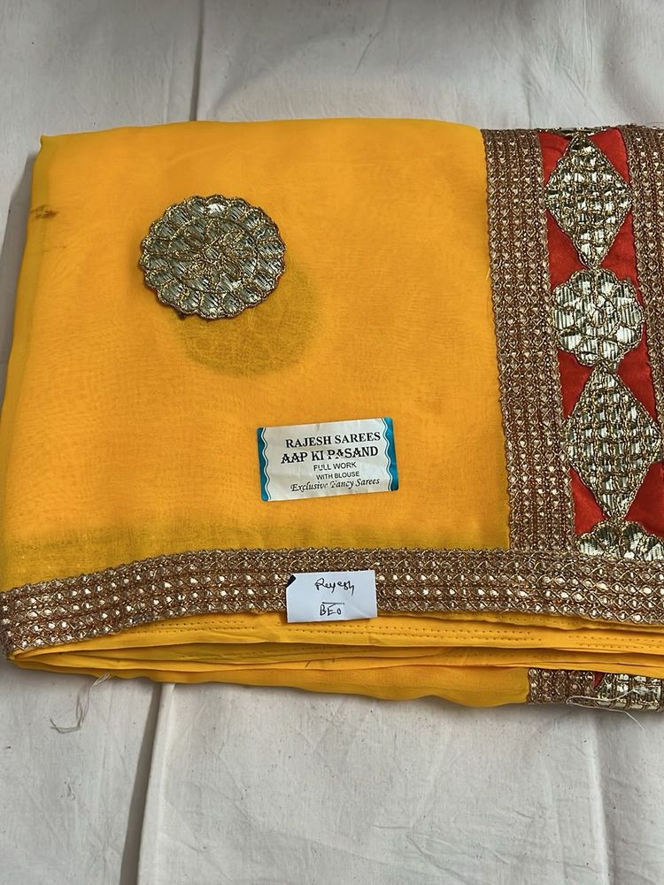 Vibrant Yellow Embellished Saree