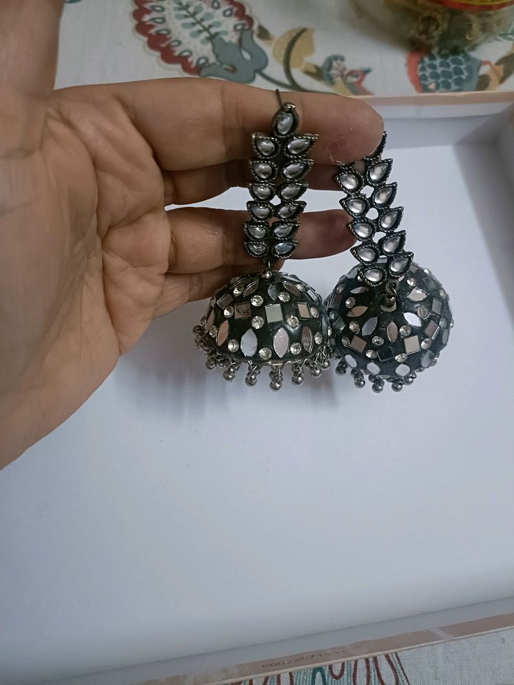 Very Smart Metal Jhumkas With Silver Stones