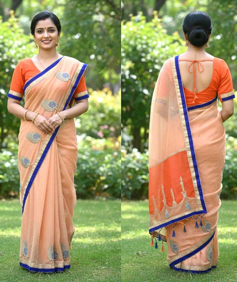 Elegant Heavy Peach Saree with Blue Border