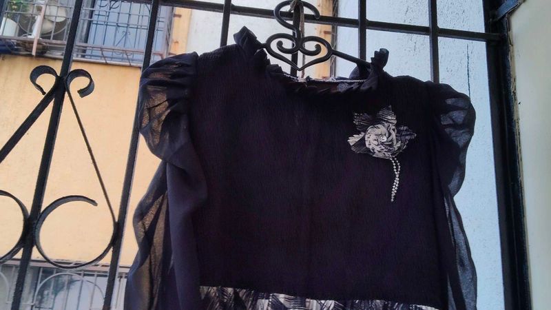 Elegant Black gown with Floral Embellishment