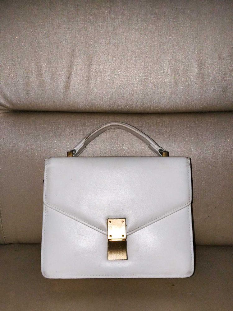 Classic White Structured Handbag with Gold Clasp