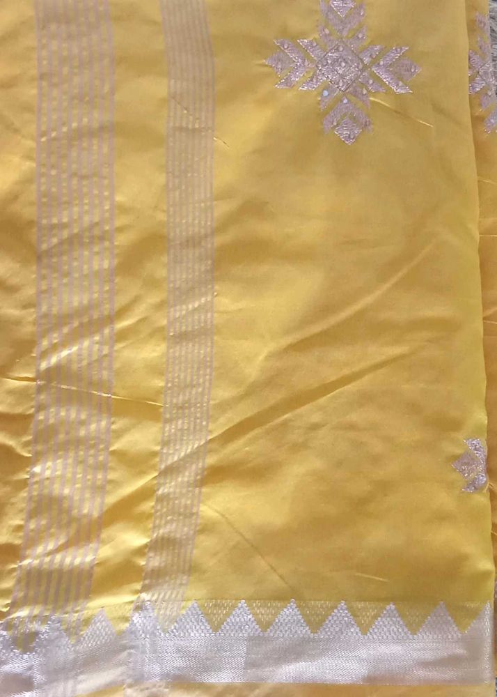 Elegant Yellow Saree with Silver Border