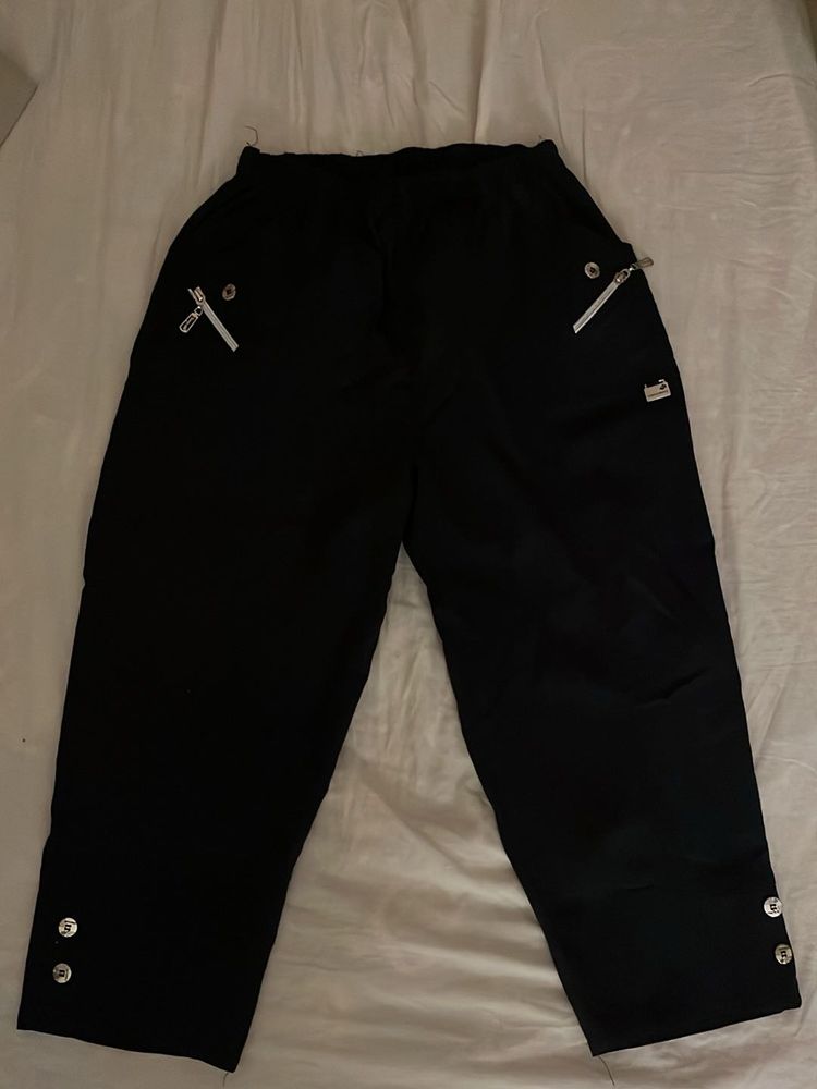 Stylish Black Cropped Pants with Zippers