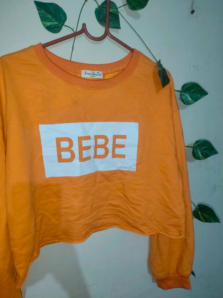 Cute BEBE Cropped Orange Long Sleeve Top