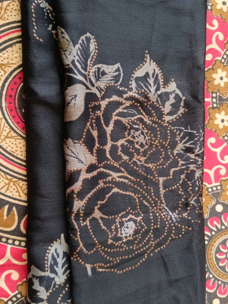 black golden and red colour saree
