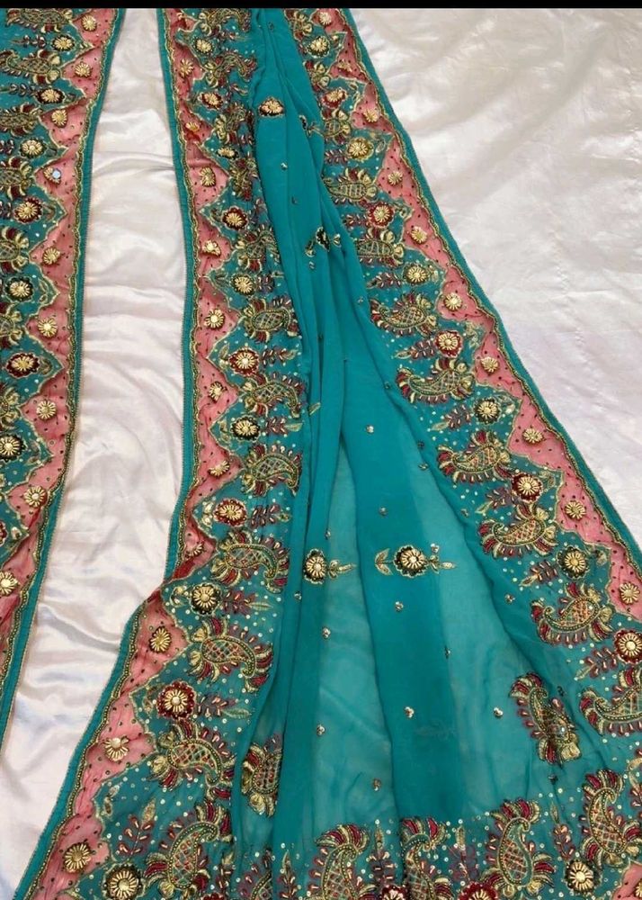 Stunning Embellished Teal Saree