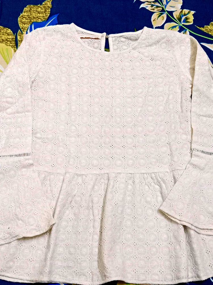 Elegant White Embroidered Peplum Top