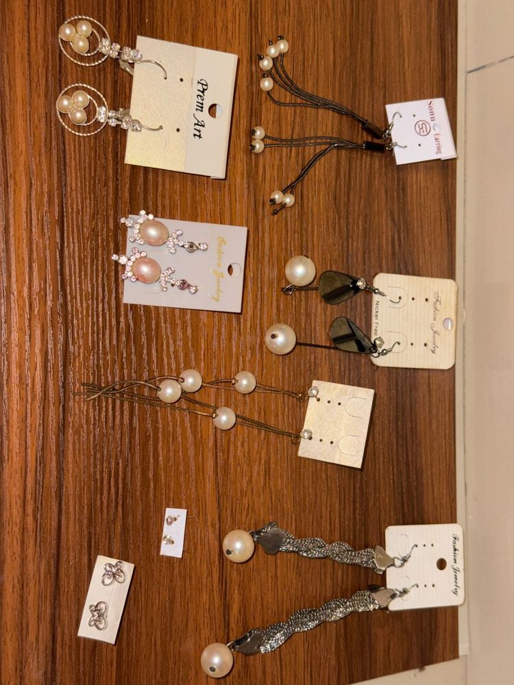 Pairs of 8 Earrings  (6 long, 2 small)