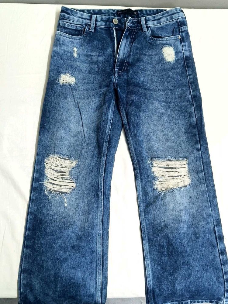 Ripped Wide Leg Blue Jeans