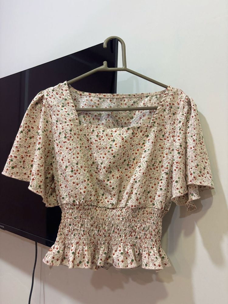 Chic Floral Smocked Peplum Top