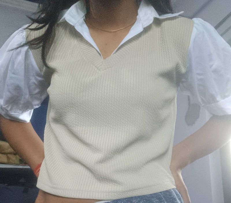 Cream Vest with White Puff Sleeves and black jeans