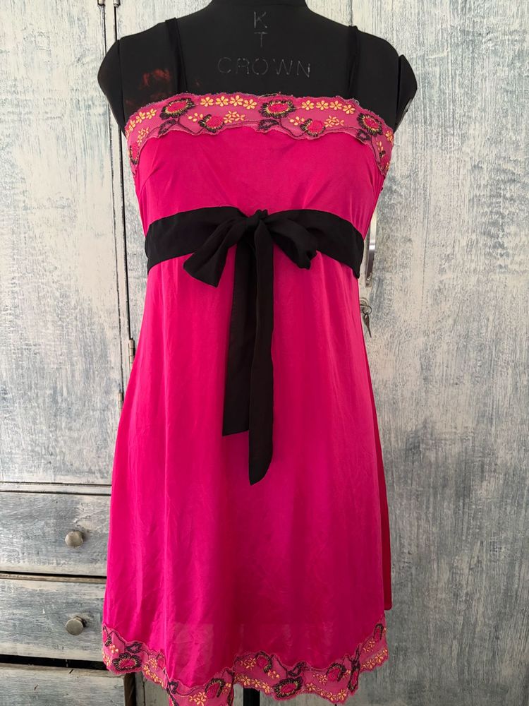 Vibrant Pink Mini Dress with Black Bow