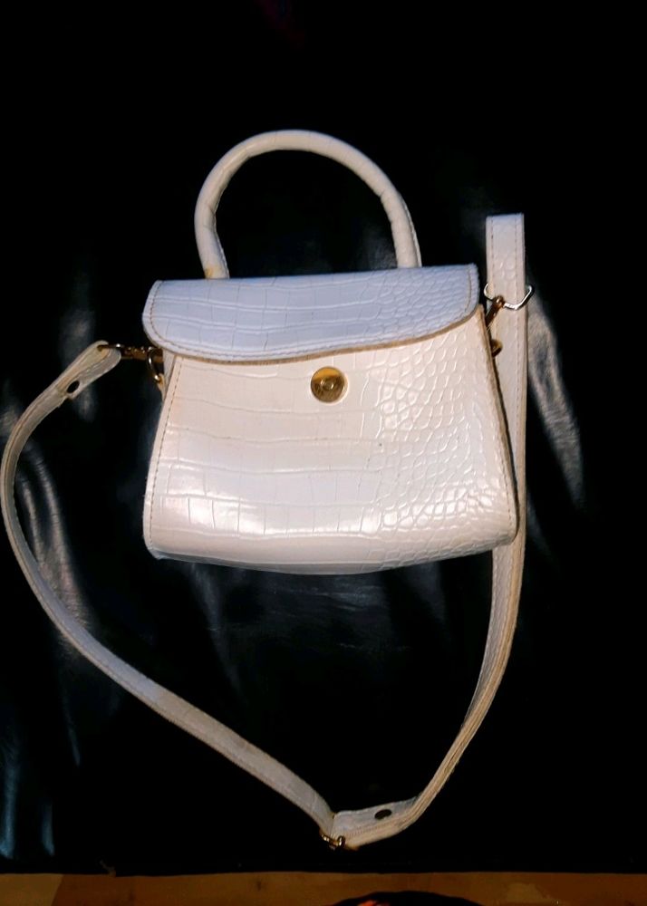 white bag sling
