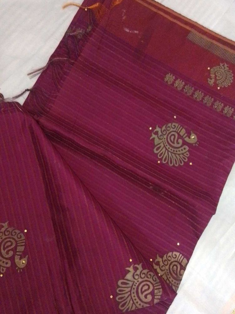Elegant Maroon Striped Saree with Peacock Motifs