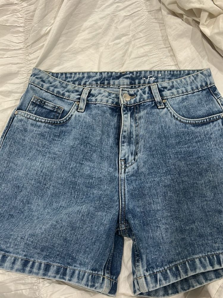 dark wash blue denim shorts