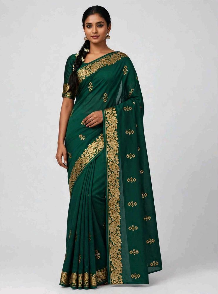 Elegant Emerald Green Saree with Gold Embellishmen