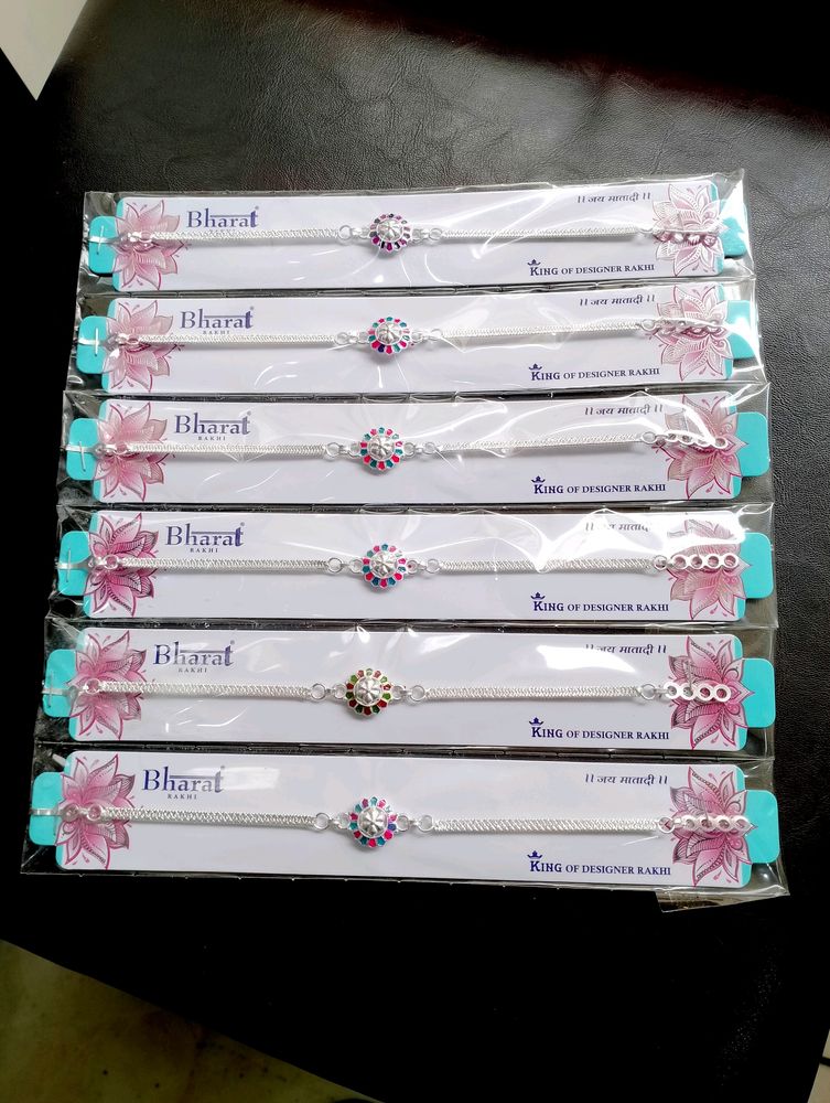 Silver Polish Designer Rakhi ( 6 Pec)