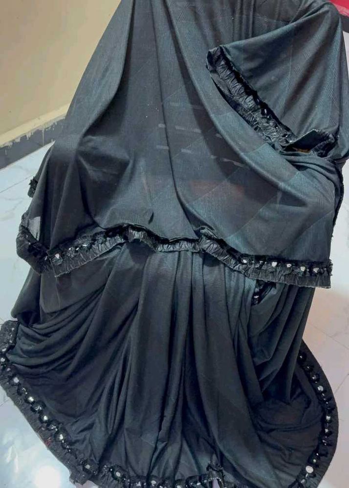 Elegant Black Saree with Embellished Border
