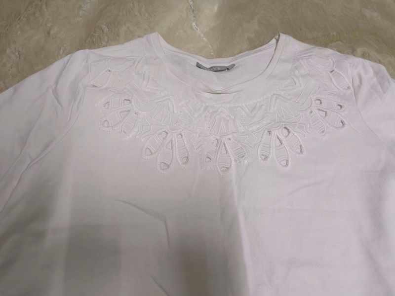 White sweater top with beautiful cut work....store