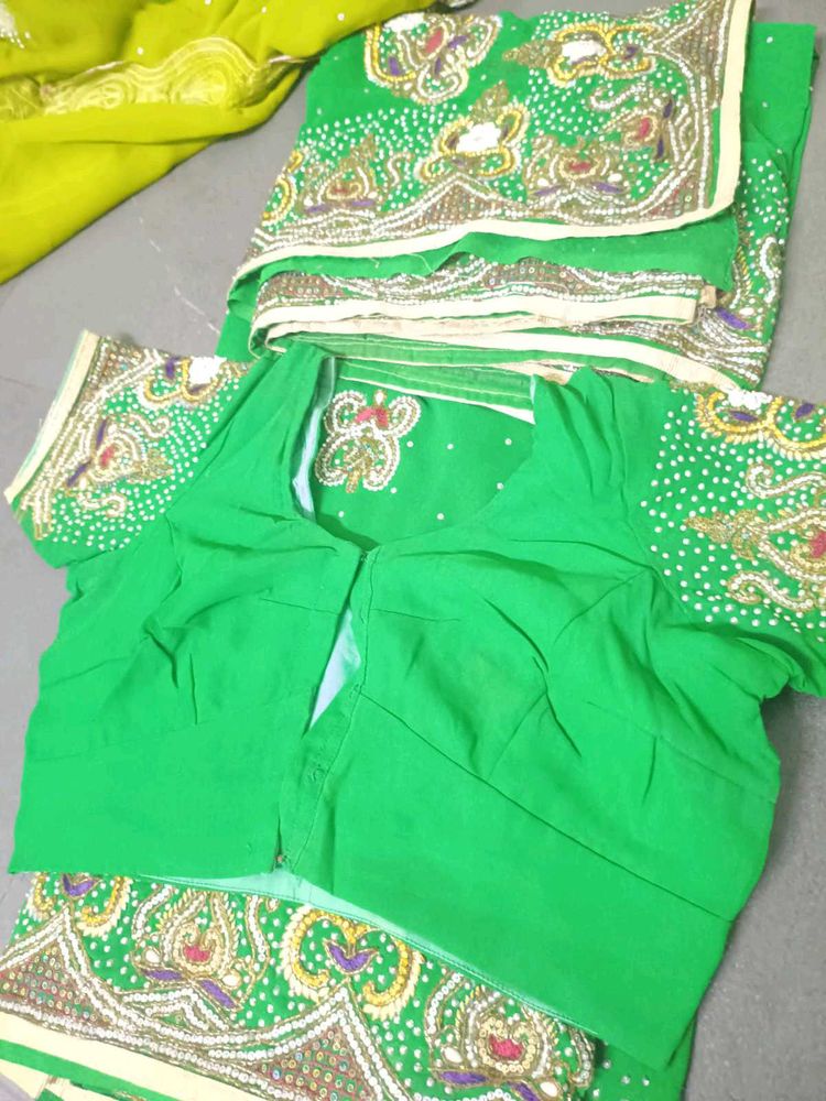 Vibrant Green Embroidered saree with stitched blou