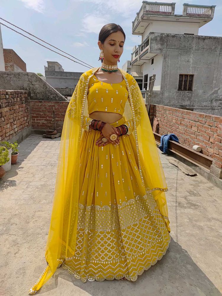 Vibrant Yellow Embellished Lehenga Choli
