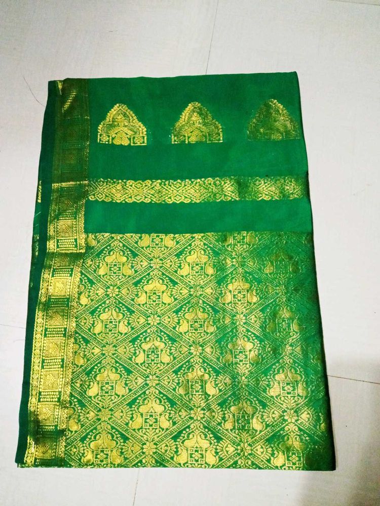 Beautiful Green Saree with Gold Border