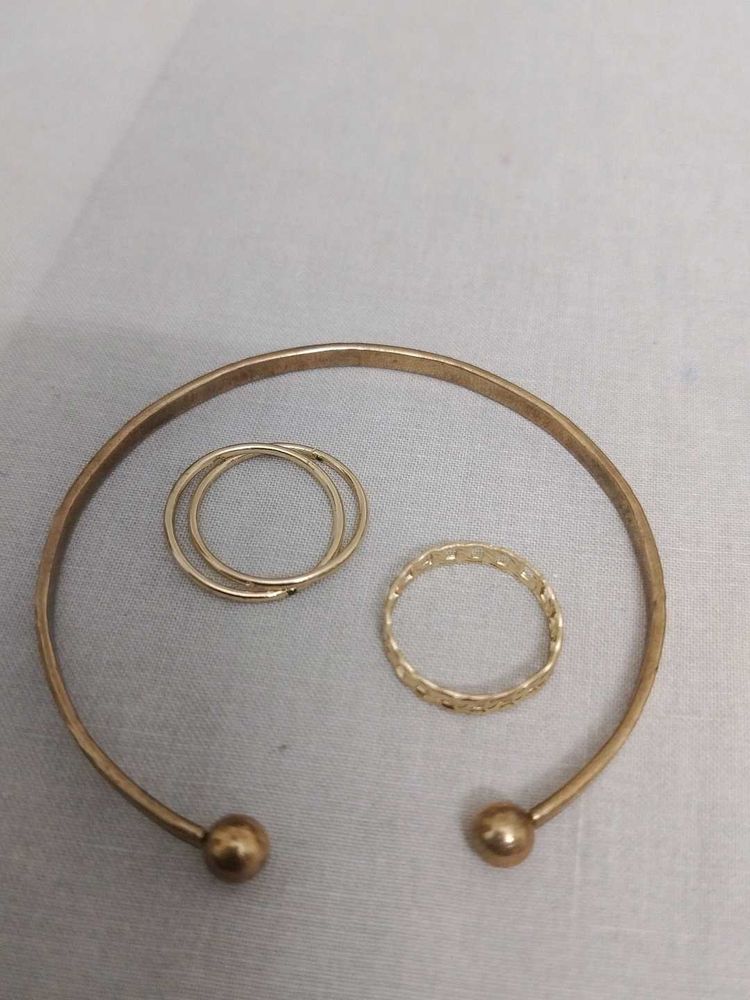 A Set Of Jwellery(1 Bracelet 2 Rings)