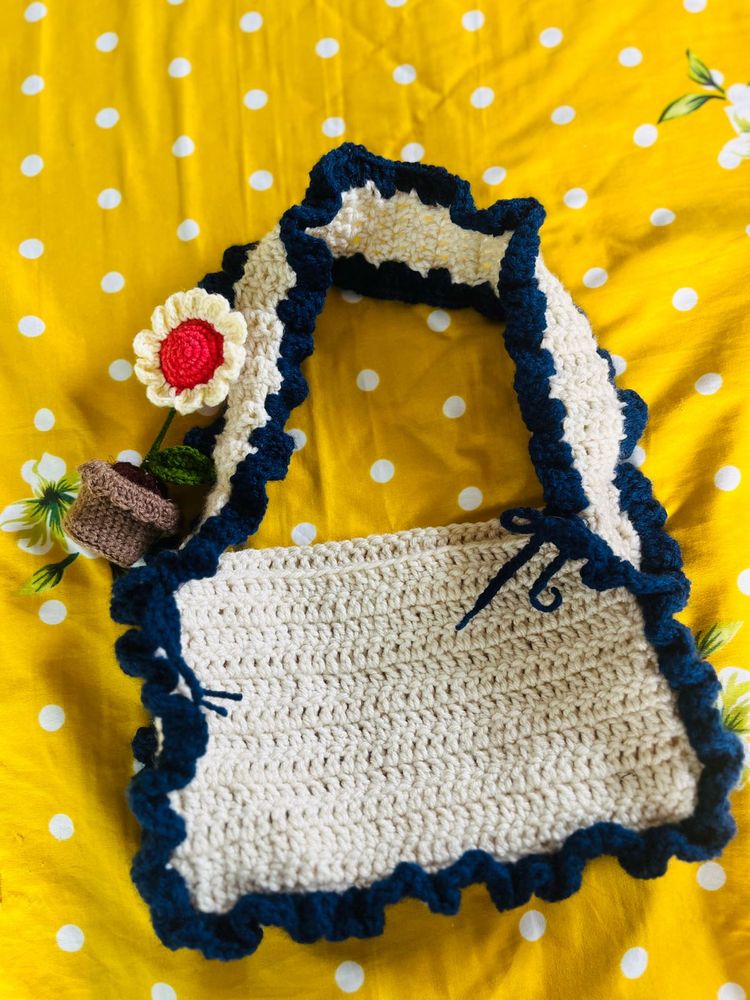 Crocheted Bag with Flower Accent
