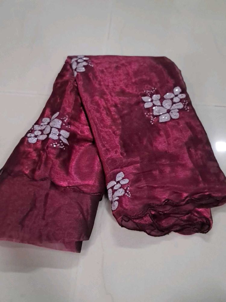 Exquisite Maroon Embellished Saree
