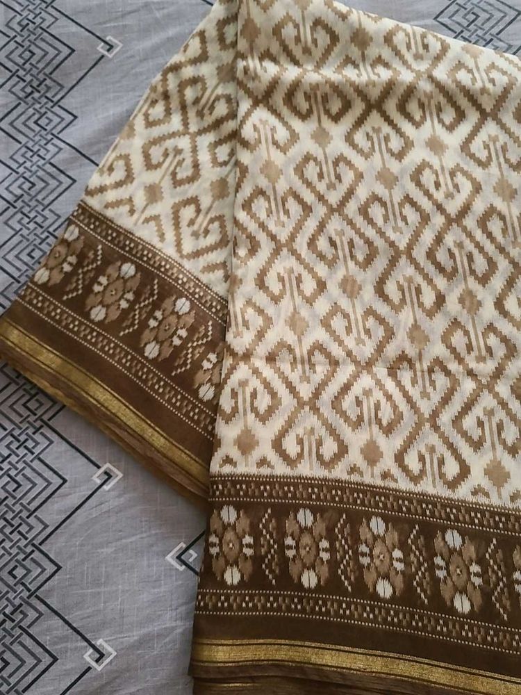 Elegant Cream and Brown Saree