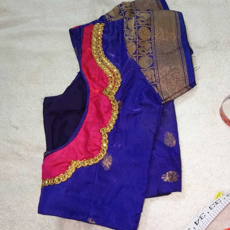 blue colour blouse with fancy back design