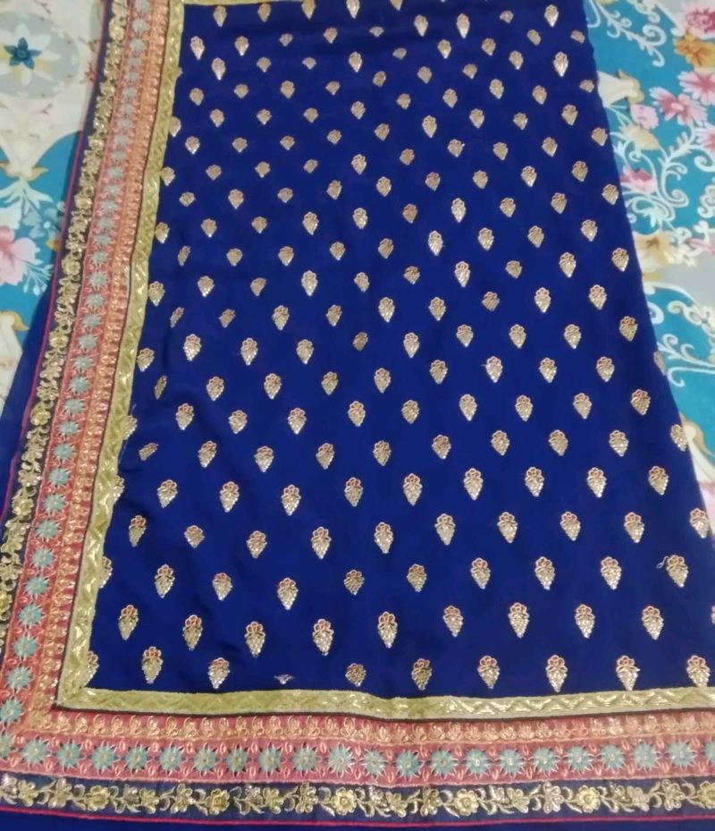 Elegant Blue Embroidered Saree