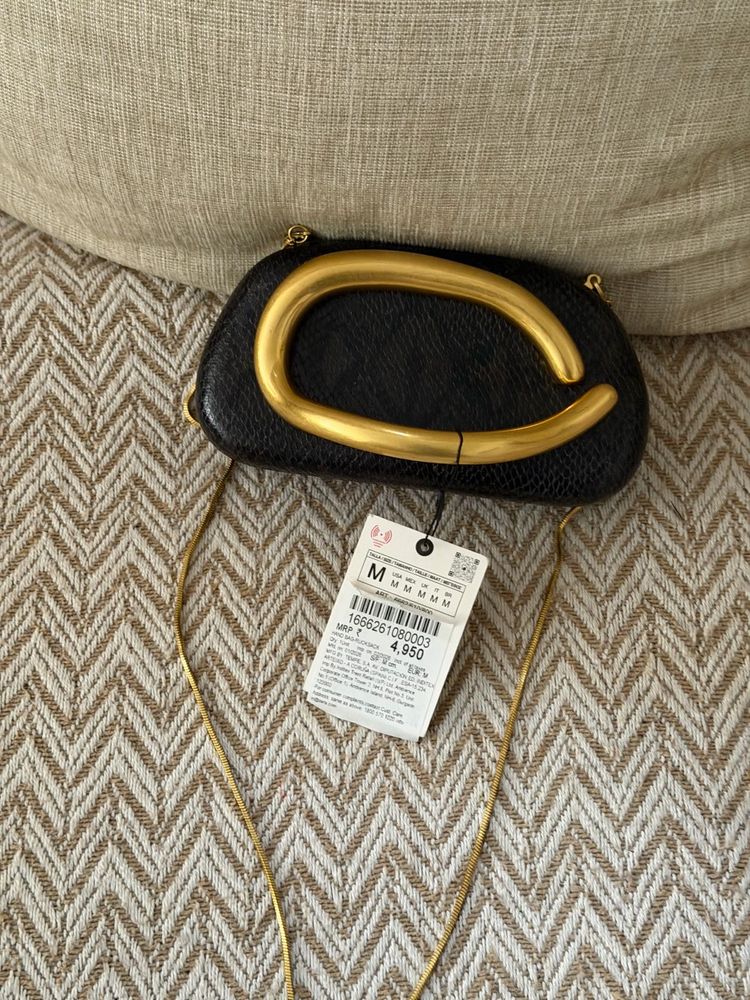 Zara Black textured Clutch with Gold Accent