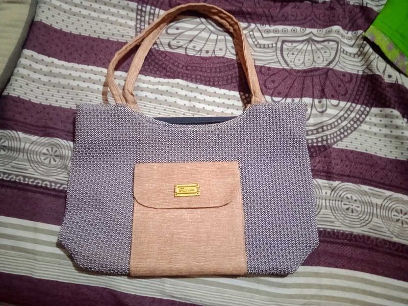 totally new spacious Handbag