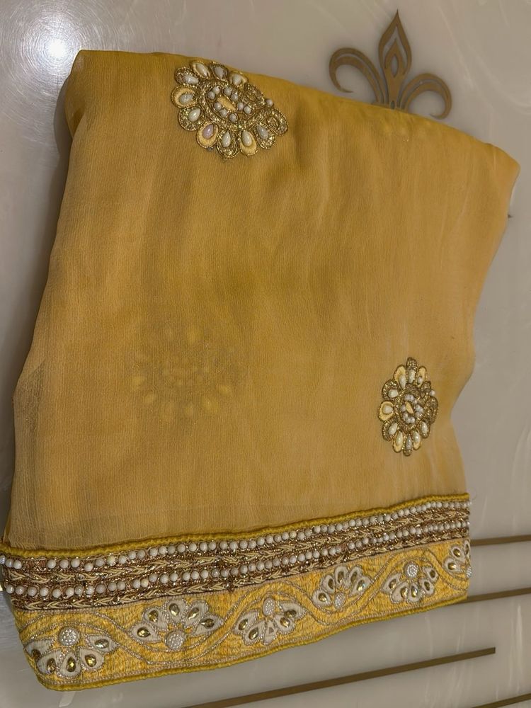 Elegant Yellow Embroidered Saree