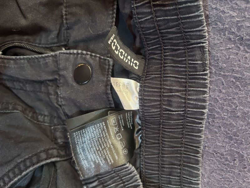 H&amp;M black corduroy trousers